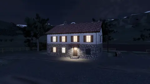 Gece pencereleri aydınlanmış çiftlik evi
